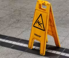 wet floor sign on concrete