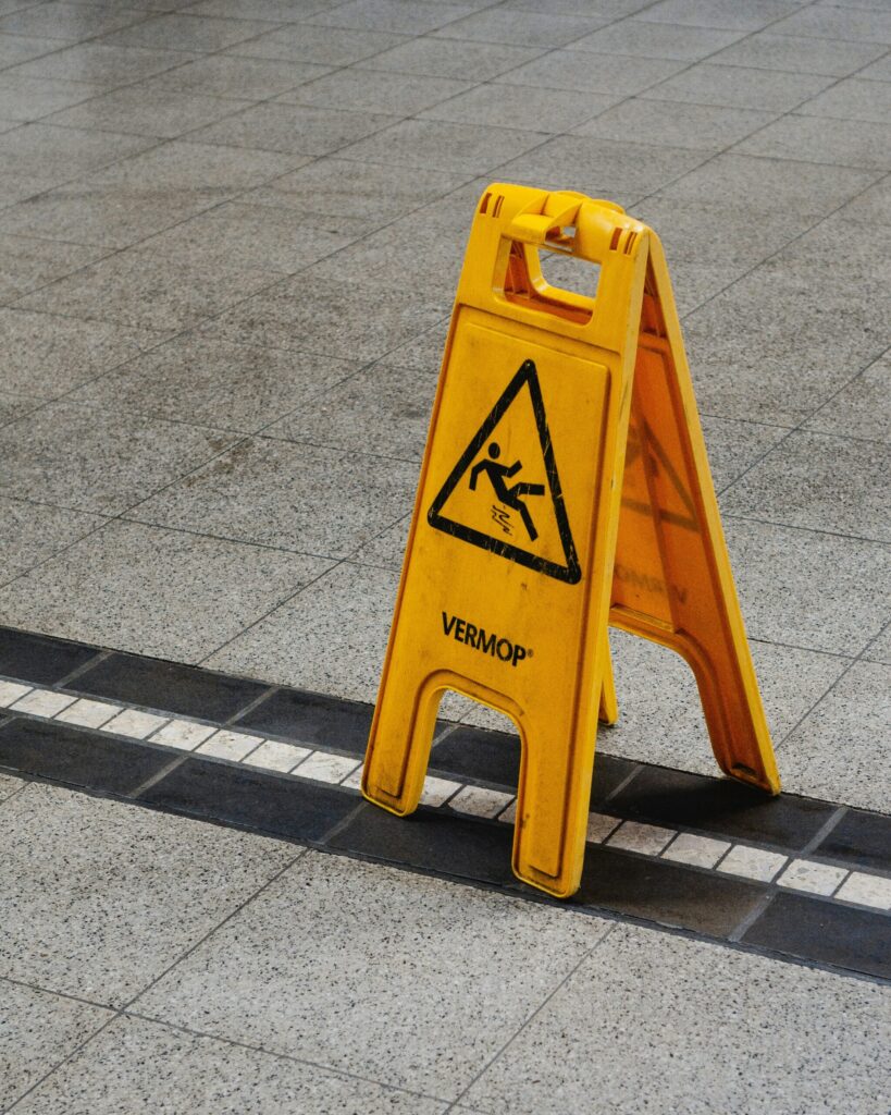 wet floor sign on concrete