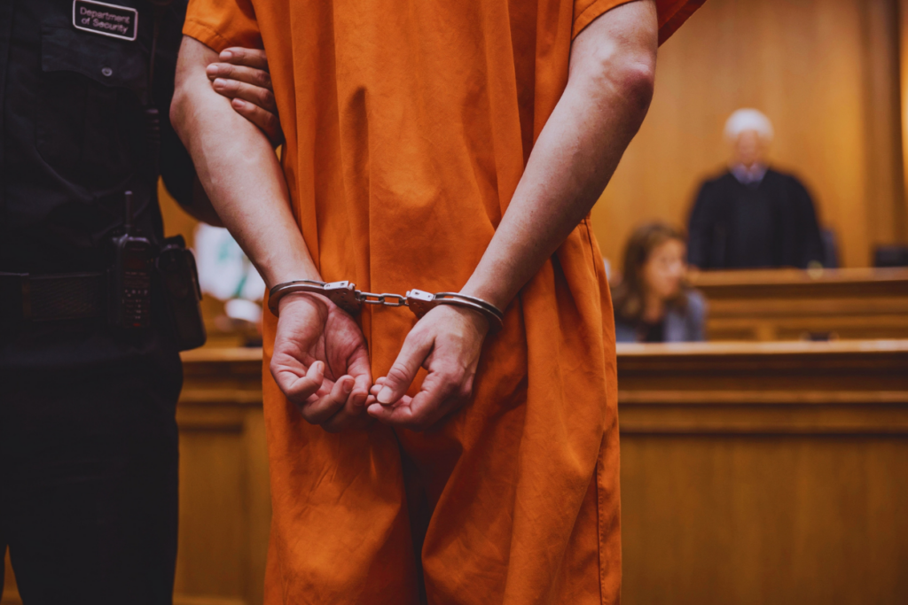 A person in court charged with a criminal offence